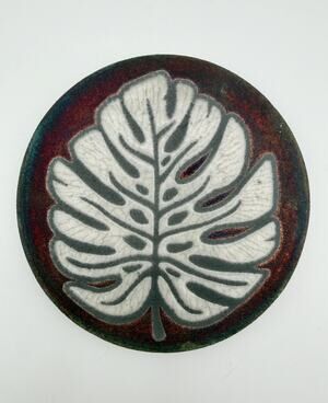 Jeremy Diller Raku Pottery Coaster 4.25” with White Monstera Leaf Signed
